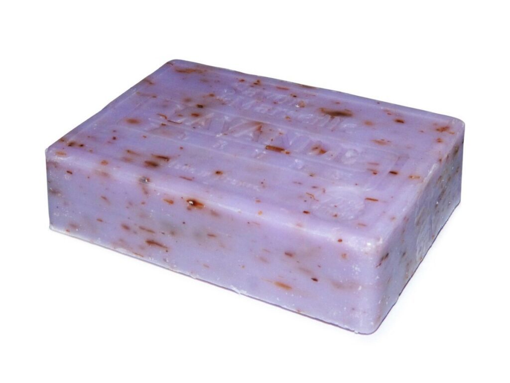 Lavender scented bar of soap on white background