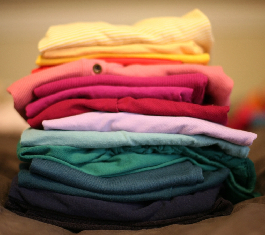 Stack of neatly folded colorful clothes