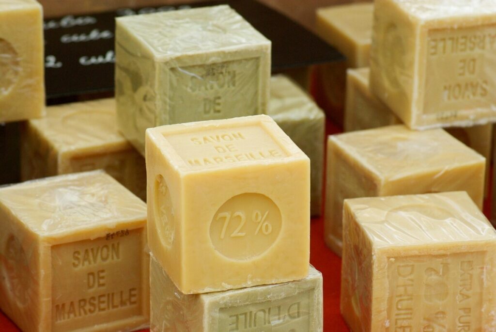Cubes of Marseille soap stacked at a market stall